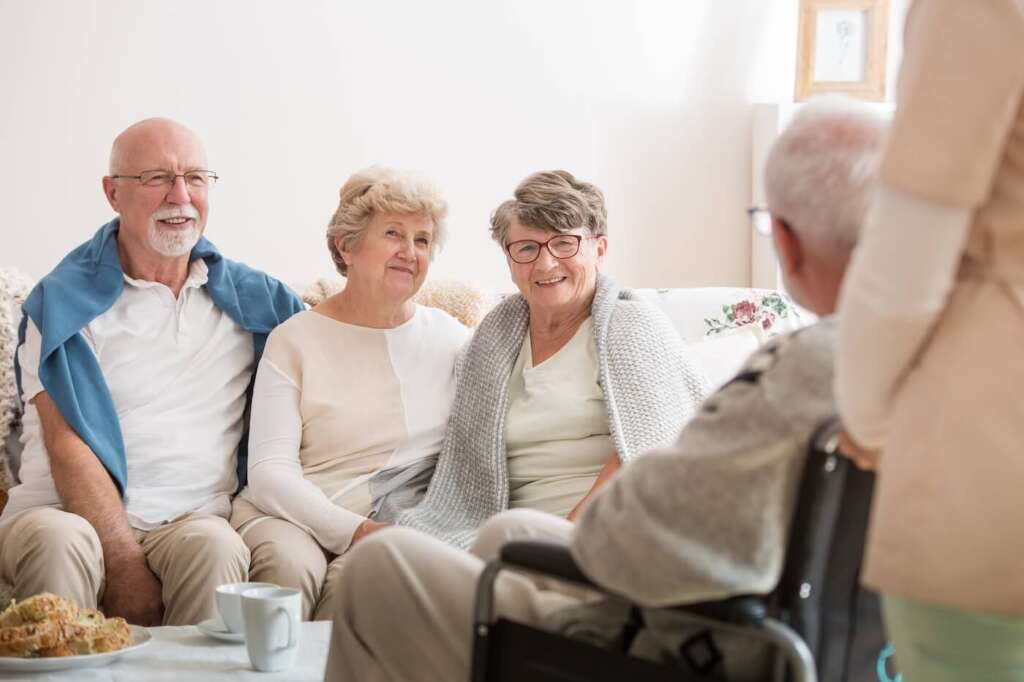 assisted living residents social gathering inside