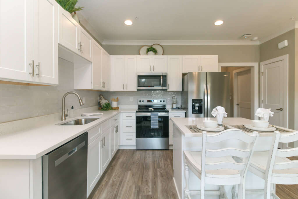 Kitchen and dining area in Independent Living at The Landing of Winder
